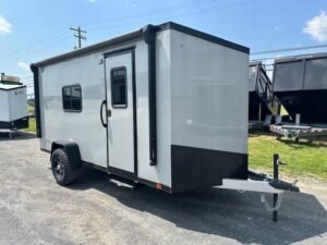 2024-ATC-6.7X14-ALUMINUM-CARGO-TRAILER-ST350-FINISHED-INTERIOR-LIFETRAC-MICROWAVE-SINK-1.jpg ATC 6.5 x 14 Aluminum Enclosed Trailer – Adventure Package