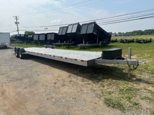 2025-7x35-JF-OPEN-CAR-HAULER-SLIDE-OUT-RAMPS-4.jpg 2025 JF Trailers 7×35 Galvanized Car Trailer – Torsion Axles