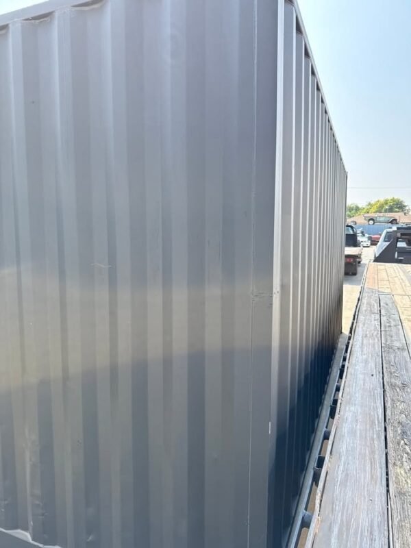 518288731_24084520584536835_7796433739846501905_n.jpg 20ft Used Shipping Container – Matte Black w/ 12’ Side Roll-Up Door