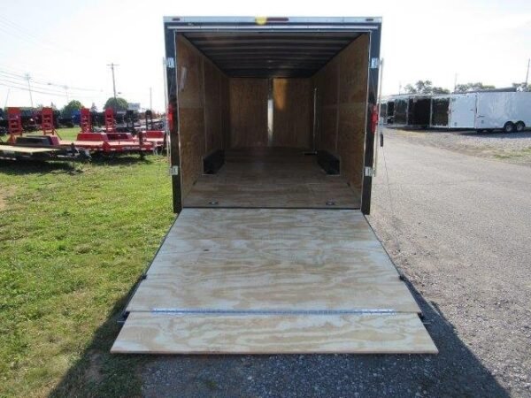 Homesteader-8.5x24-Enclosed-Car-Hauler-Ramp-Door-Side-Door-Added-Height-Adjustable-Coupler-9.jpg Homesteader 8.5 x 24 Enclosed V-Nose Car Trailer – 6″ Added Height