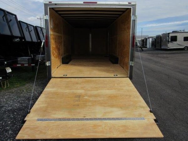 Homesteader-8.5x24-V-Nose-Enclosed-Car-Hauler-Ramp-Door-Extended-Tongue-7.jpg Homesteader 8.5 x 24 Enclosed V-Nose Car Trailer – Extended Tongue